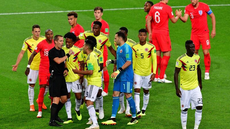 Colombia’s players remonstrate with the referee. Photograph: Getty Images