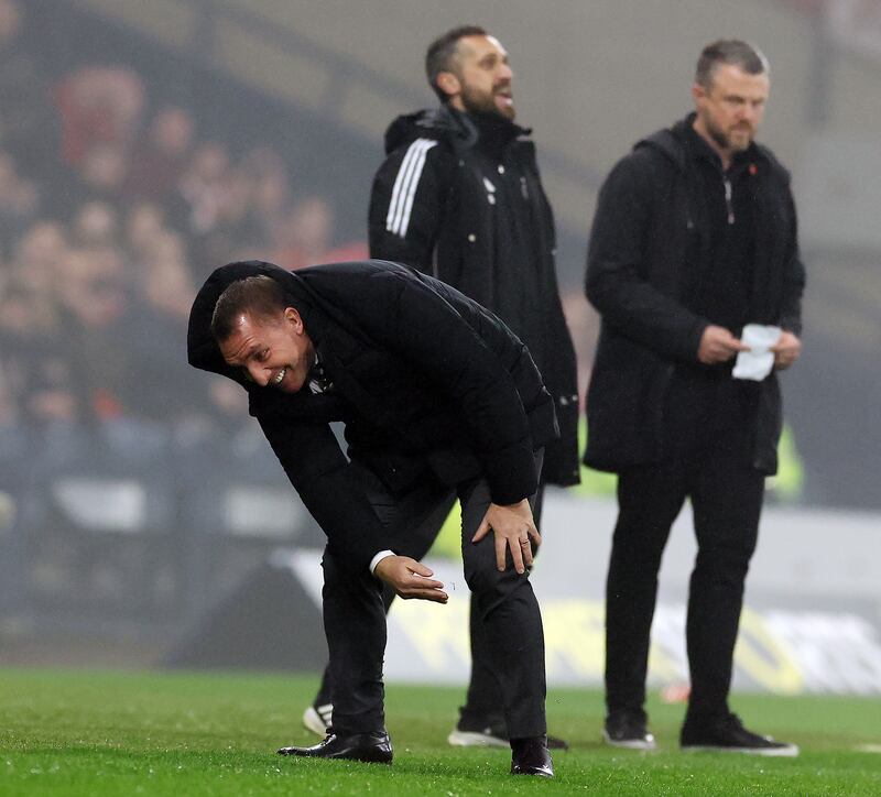 Celtic manager Brendan Rodgers gets back to his feet after slipping over while kicking the ball at Hampden Park. Photograph: Ian MacNicol/Getty Images