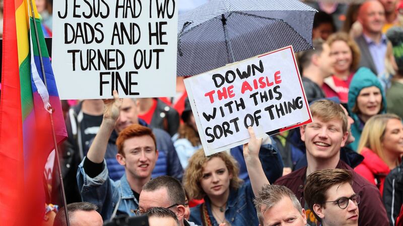 People take part in a march in Belfast city centre demanding same sex marriage in Northern Ireland. Photograph: Brian Lawless/PA