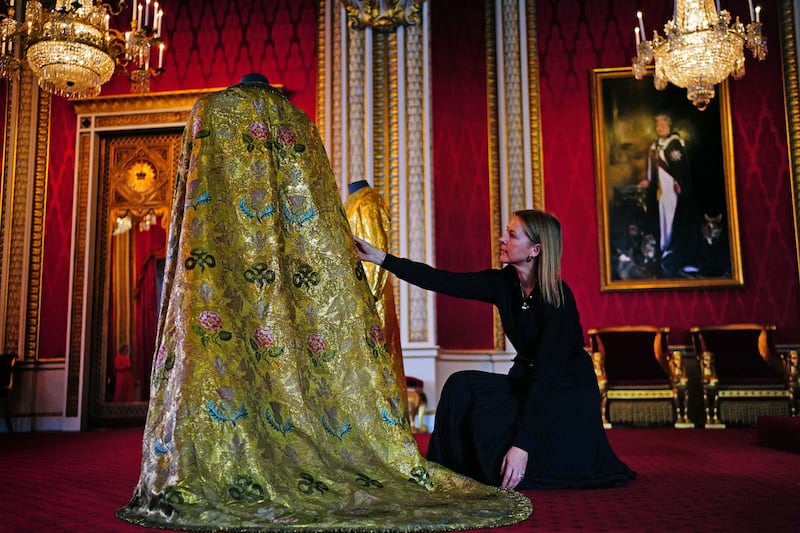 The Imperial Mantle, which forms part of the king's coronation vestments, displayed in the Throne Room at Buckingham Palace. Photograph: Victoria Jones/PA Wire