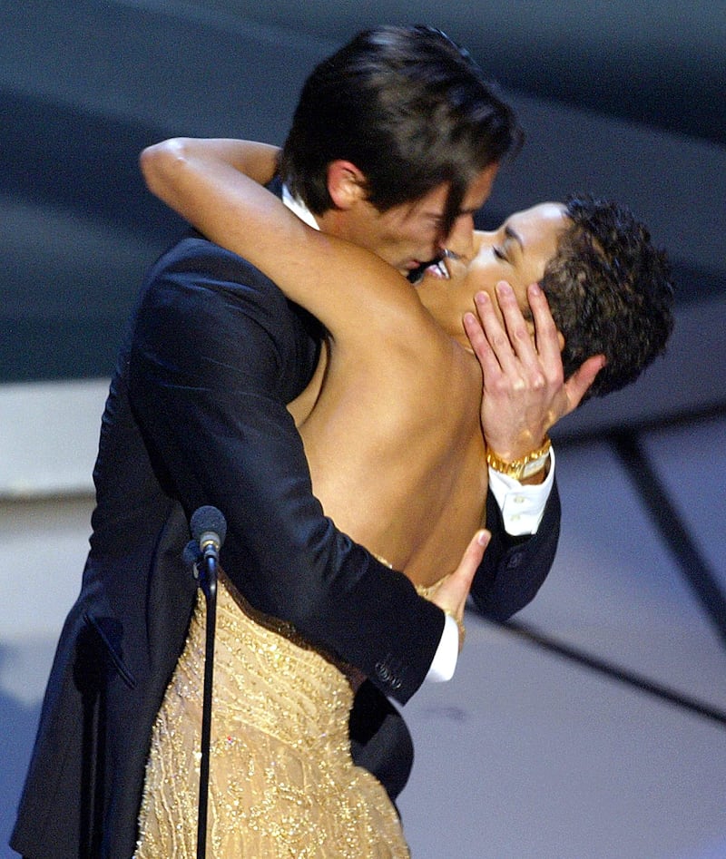 Adrien Brody kisses Halle Berry as he accepts an Oscar for his role in The Pianist, March, 2003. Photograph: Timothy A Clary/AFP via Getty Images