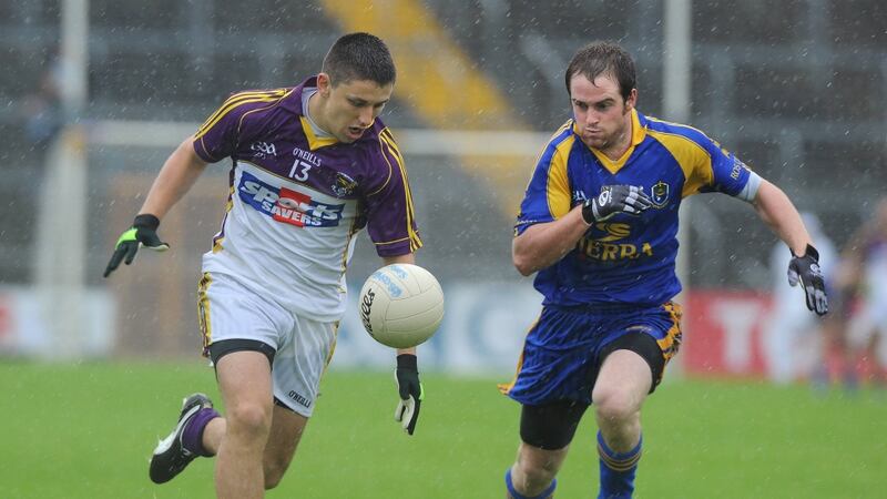 Ronan Brady (left) in action with Roscommon. Photograph: Matt Browne