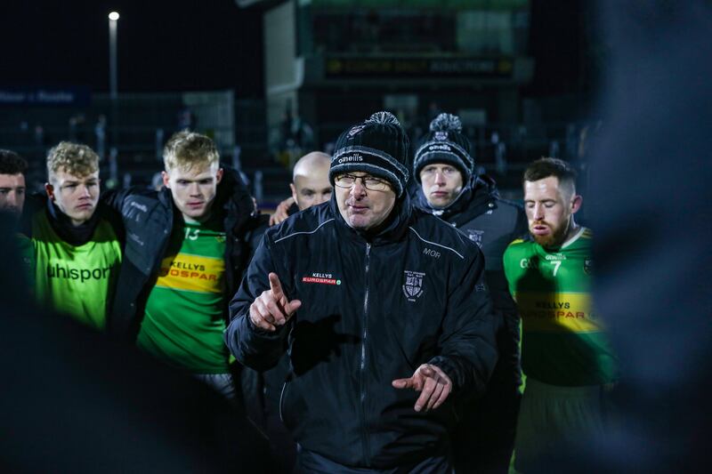 Glen manager Malachy O'Rourke speaking to his players after the Ulster Senior Club Football Championship semi-final win over Naomh Conaill. Photograph: Lorcan Doherty/Inpho