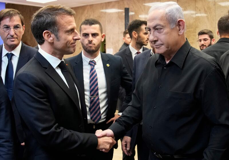 French president Emmanuel Macron and Israeli prime minister Binyamin Netanyahu shake hands after their joint press conference in Jerusalem on Tuesday. Photograph: Christophe Ena/AFP via Getty Images