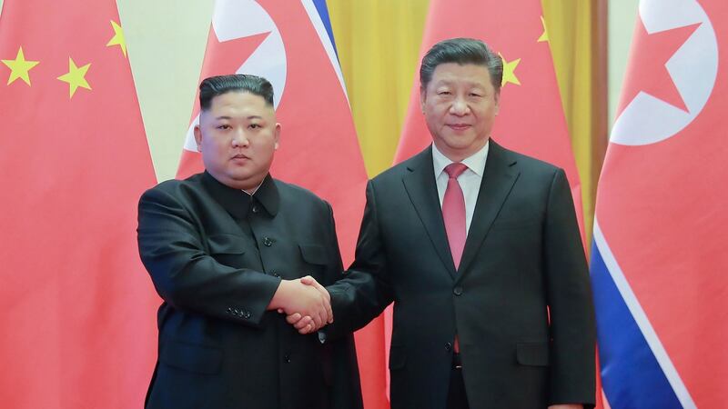 Kim Jong-un  with China’s President Xi Jinping in Beijing. Photograph: KCNA via KNS/AFP/Getty Images