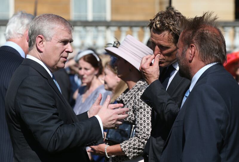 Prince Andrew, Duke of York, meets James Cracknell and Martin Roberts at the Royal Society for the Prevention of Accidents Centenary Garden Party at Buckingham Palace, London last May.