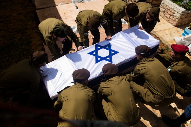 Israeli soldiers carry the coffin of Dor Yarhi, who was killed in a battle with Palestinian militants near the Israeli border with the Gaza Strip during his funeral in Rishon Lezion, Israel. Photograph: Amir Levy/Getty Images