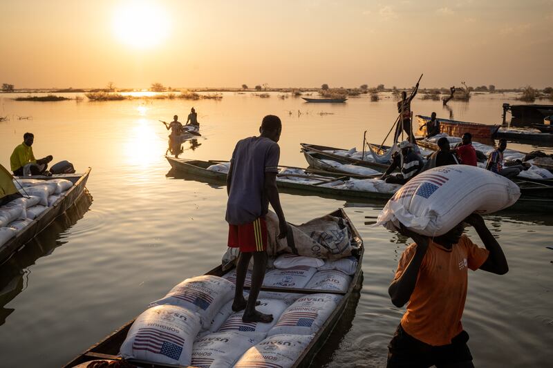 Food aid funded by the US arrives in Bentiu, South Sudan on Saturday. Photograph: Jim Huylebroek/New York Times
                      