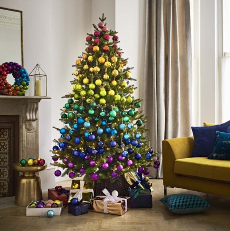 Rainbow Christmas tree: create a striking effect by layering colours to create a spectacular seasonal spectrum