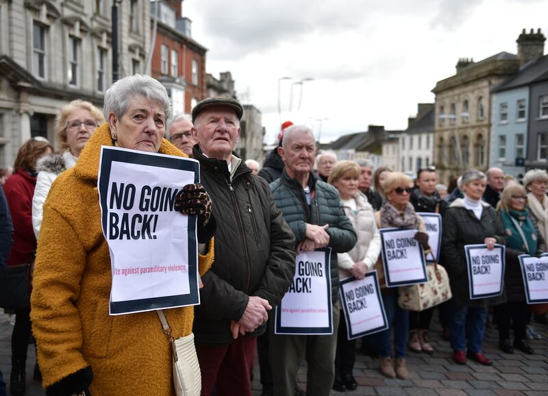 A rally with posters referring to the Troubles in Northern Ireland is held in Omagh, Co Tyrone, in support of PSNI Det Chief Insp John Caldwell, who was shot by suspected dissident republicans on Wednesday while attending a football coaching session with his son. Photograph: Charles McQuillan/Getty