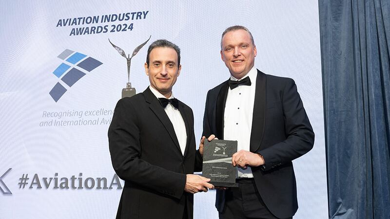 Kyriakos Kourousis, awards judge, presents the MRO achievement award to Martin O'Connell, International Aerospace Coatings