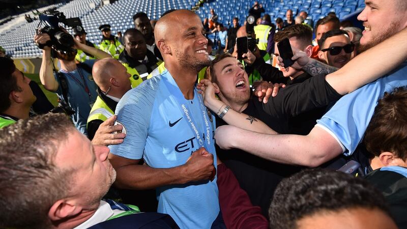 Manchester City’s Belgian defender Vincent Kompany after his team sealed the Premier League title at Brighton. Photograph: Getty Images