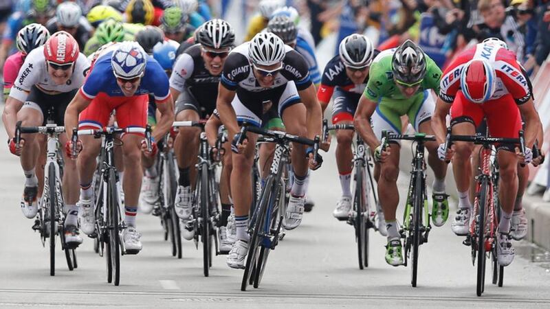 Germany’s Andre Greipel, left, France’s Arnaud Demare, second left and third place, stage winner Marcel Kittel of Germany, centre, Peter Sagan of Slovakia, second right, and Norway’s Alexander Kristoff, far right and second place, sprint towards the finish line during the fourth stage of the Tour de France. Photograph: Peter Dejong/AP