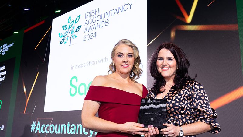 Judith Condell, business development director, CPA Ireland, presents the tax team of the year award to Aveen McShane, FPM.