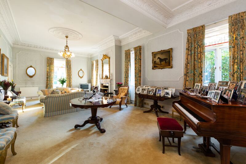 Throughout the house, there are lovely stained glass panels in the upper registers of the windows, which retain their brass fittings.