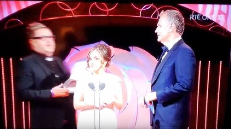 Fathers4Justice protester Matt O’Connor interrupting the Rose of Tralee before holding  up a picture of his son and shouting “fathers for justice” and  continuing: “To all the fathers in this country who are denied access to their children, please join me and the broken families of Ireland.” Photograph: RTÉ/screengrab