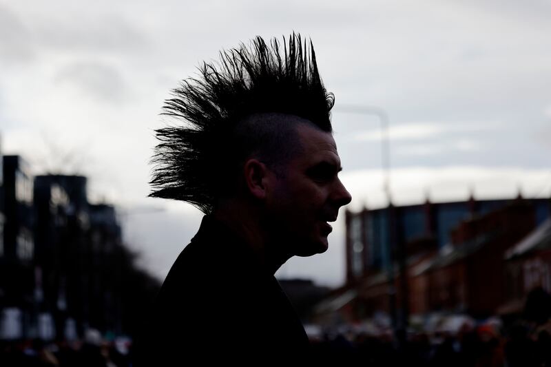 John Farrell from Tallaght watching the procession leaving Shelbourne Park. Photograph: Alan Betson 
