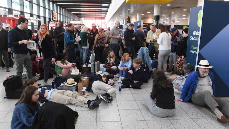 Passengers waiting within Gatwick airport on  December 20th Photogrph: FaCundo Arrizabalaga/EPA