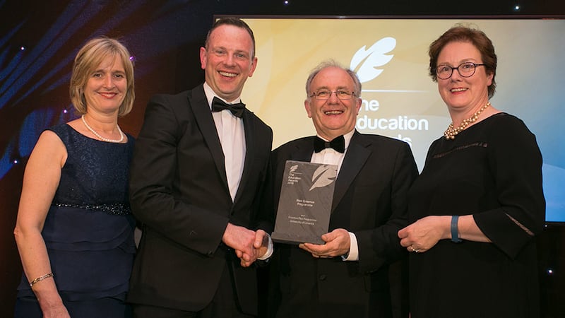 Dr. Matt Cottrell, Head of School of Mechanical, Electrical and Process Engineering, Cork Institute of Technology presents the Best Erasmus Programme Award to University of Limerick Team.