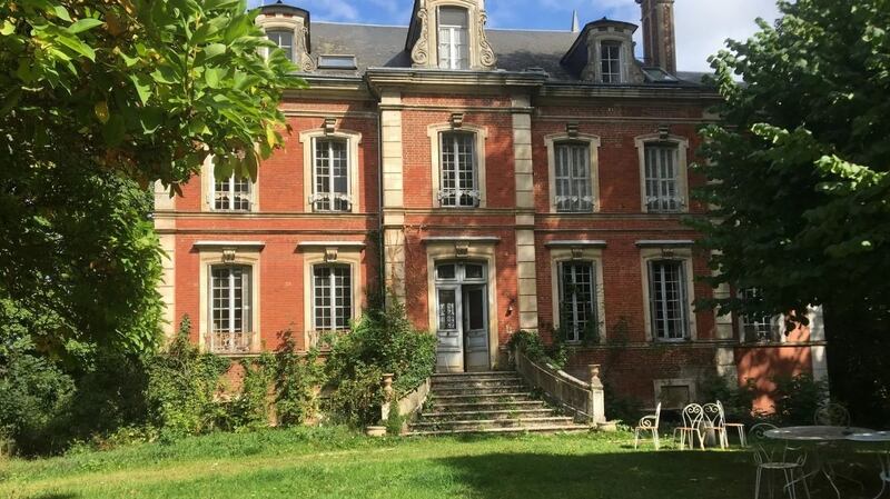 This  French property  has lovely period details including parquet flooring