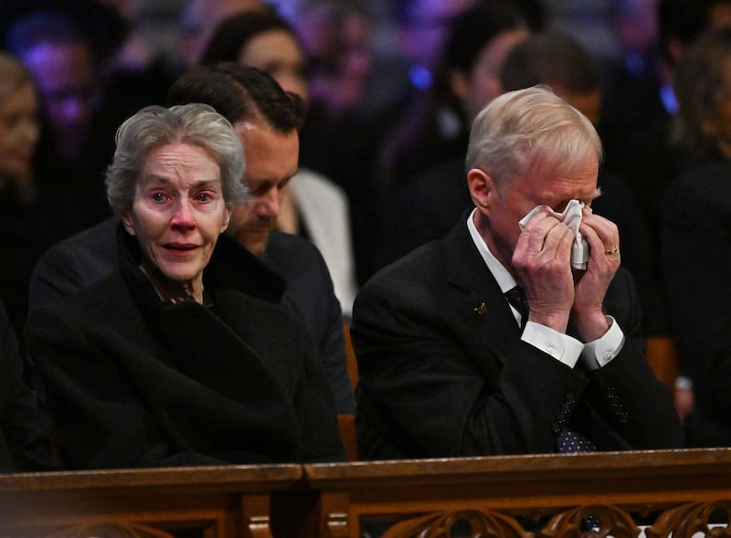 Jimmy Carter's son Jack Carter and his wife Liz react during the state funeral service for the former US president. Photograph: Ricky Carioti/AFP via Getty Images