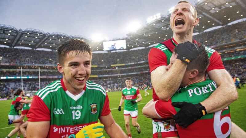 Mayo’s Colm Boyle celebrates at the final whistle with Stephen Coen. Photograph: Tommy Dickson/Inpho