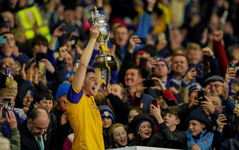 Donal Burke lifts the trophy after Na Fianna's victory in the Senior Club Hurling Championship final. Photograph: James Lawlor/Inpho