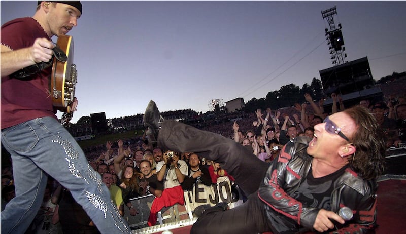 Elevated: Bono and the Edge on stage during the U2 August 2001 concert in Slane, Co Meath. Photograph: Dara Mac Dónaill