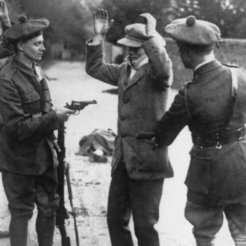 Black and Tans: temporary constables search a suspected Sinn Féin member in 1920. Photograph: Hulton/Getty