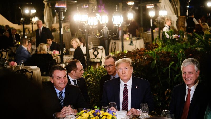 Donald Trump hosts Jair Bolsonaro at a dinner at Mar-a-Lago in Palm Beach, Florida, in March 2020. Photograph: TJ Kirkpatrick/New York Times