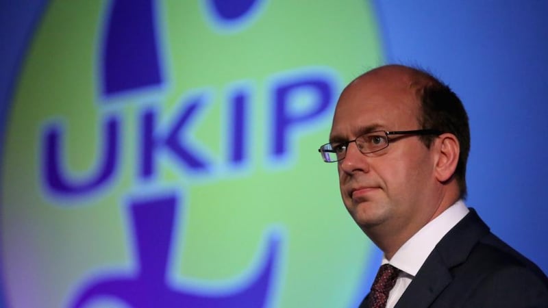 Former Conservative MP Mark Reckless addresses Ukip party members after he announced he was defecting from the Tories and joining Ukip. Photograph: Getty