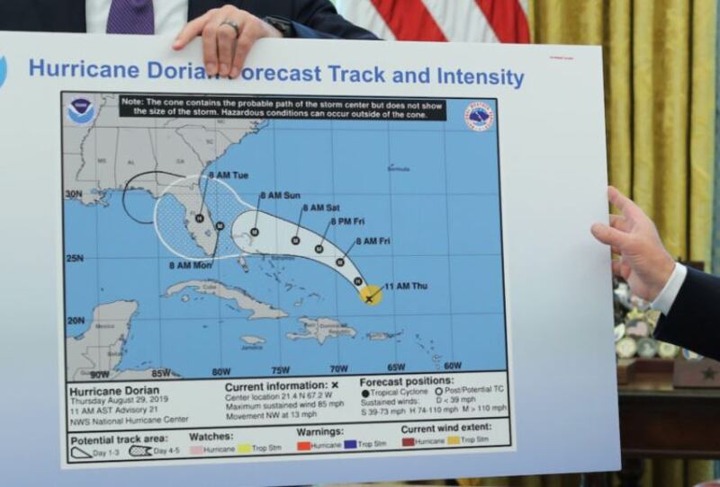 The National Hurricane Center map with a black loop, apparently drawn by pen, extending the potential path of Dorian into Alabama. Photograph: REUTERS/Jonathan Ernst