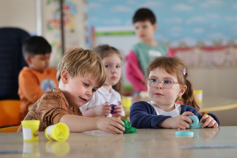 Junior infants Terry Doyle and Cara McCormack on their day at school in Leixlip Educate Together. Photograph: Dara MacDónaill/The Irish Times 







