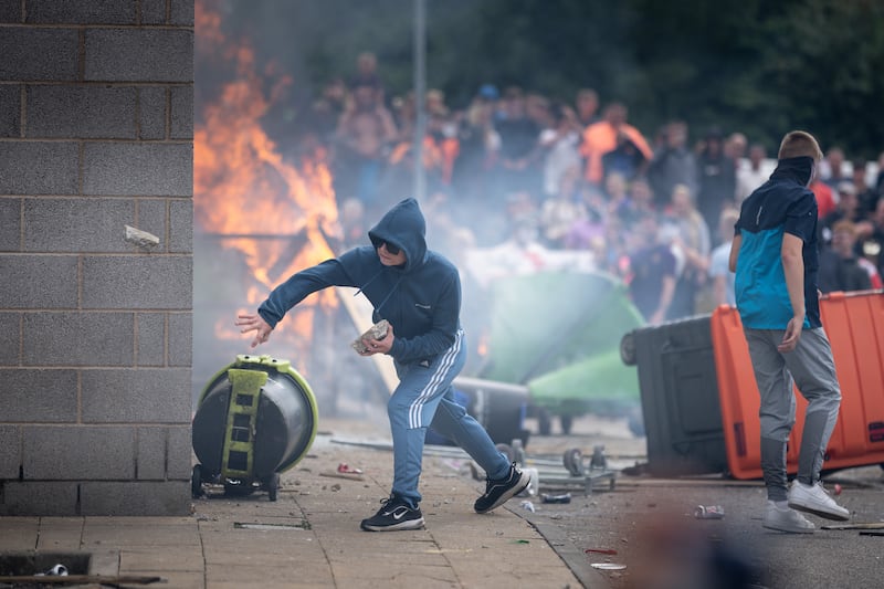 Anti-migration protesters outside the Holiday Inn Express Hotel in Rotherham, South Yorkshire, last August. Photograph: Christopher Furlong/Getty