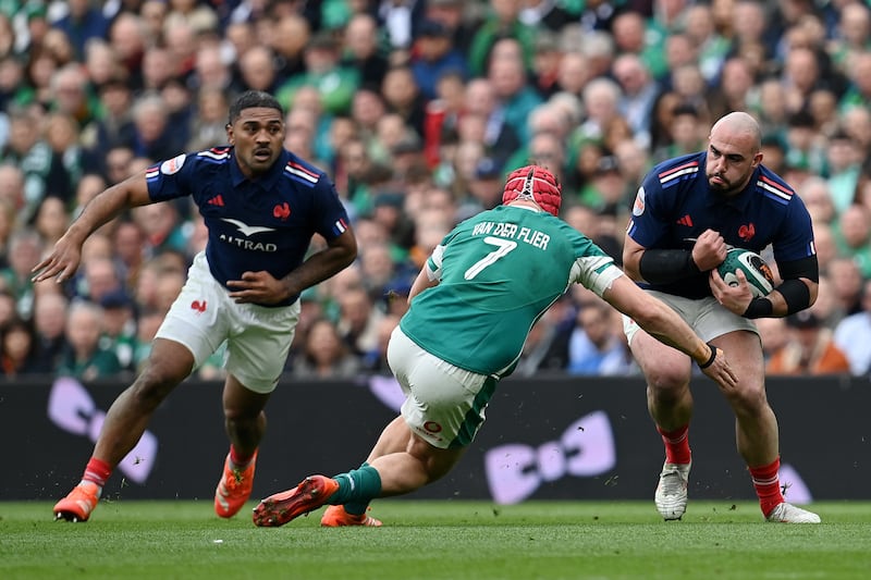 Ireland's Josh van der Flier tries to stop another France attack. Photograph: Charles McQuillan/Getty Images