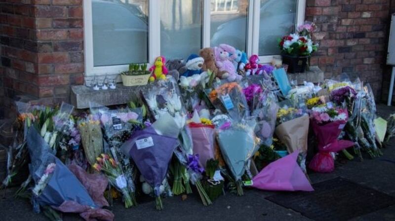 Flowers are seen outside the McGinley family’s home in Newcastle, Co Dublin on Monday. Photograph: Colin Keegan/Collins.