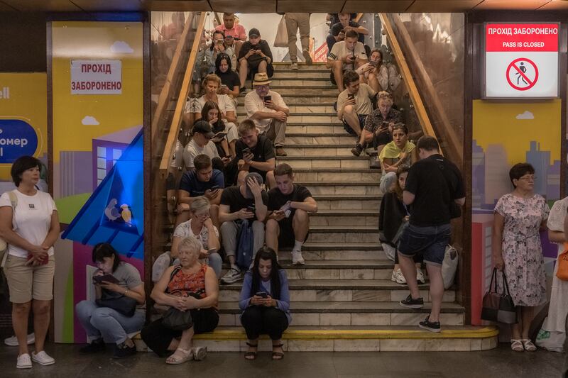 People take shelter in Kyiv's Teatralna metro station during a Russian air attack on August 26th. Photograph: Roman Pilipey/AFP via Getty