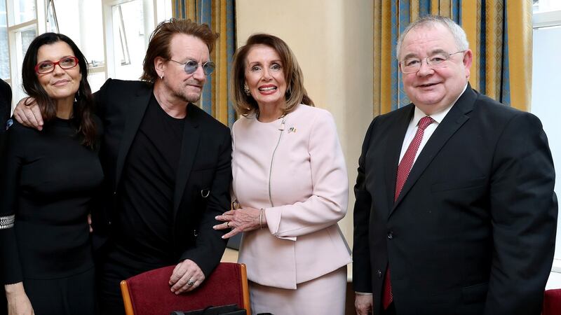 Bono and his wife Ali pose with US House speaker Nancy Pelosi  at Leinster House in Dublin. Photograph: Government pool/Maxwells/Handout via Reuters