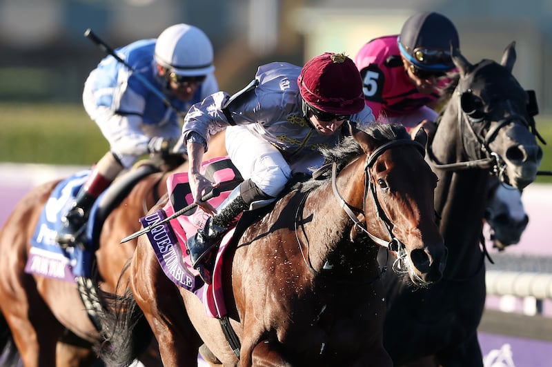 John Velazquez aboard Tok Tok and Joel Rosario aboard My Boy Prince are unable to catch Lanfranco Dettori aboard Unquestionable of France as he wins the Prevagen Breeders' Cup Juvenile Turf. Photograph Sean M. Haffey/Getty Images