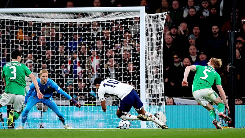 Liam Scales fouls England’s Jude Bellingham to concede a penalty, triggering an Irish collapse. Photograph: Ryan Byrne/Inpho