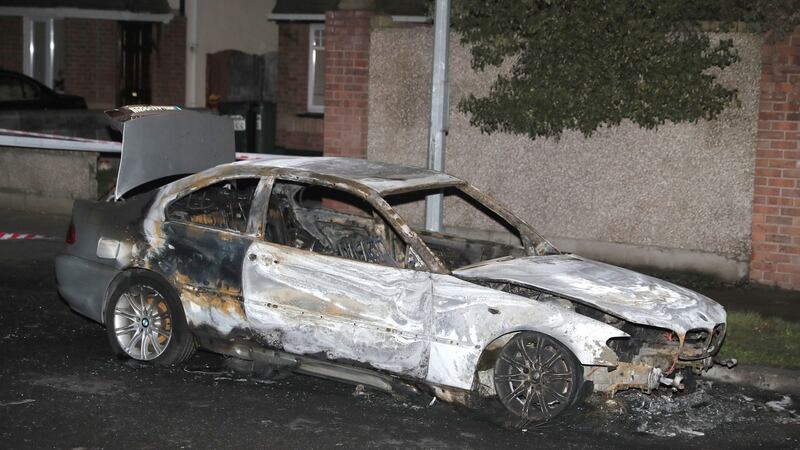 A burnt-out vehicle on Saddlers Grove near the the scene in the Blakestown Road area of Dublin. Photograph: Brian Lawless/PA Wire