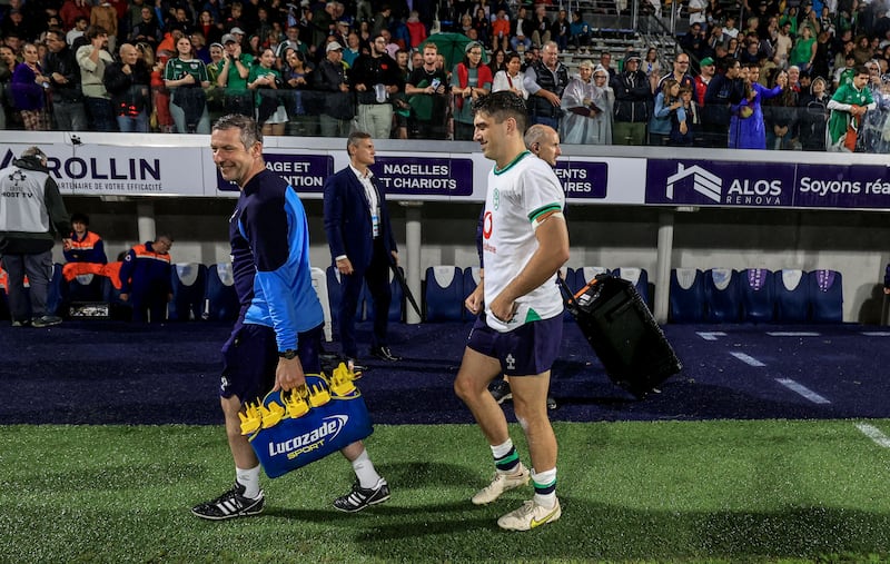 Ireland’s Jimmy O’Brien with physio Robbie Fox after the game. Photograph: Dan Sheridan/Inpho