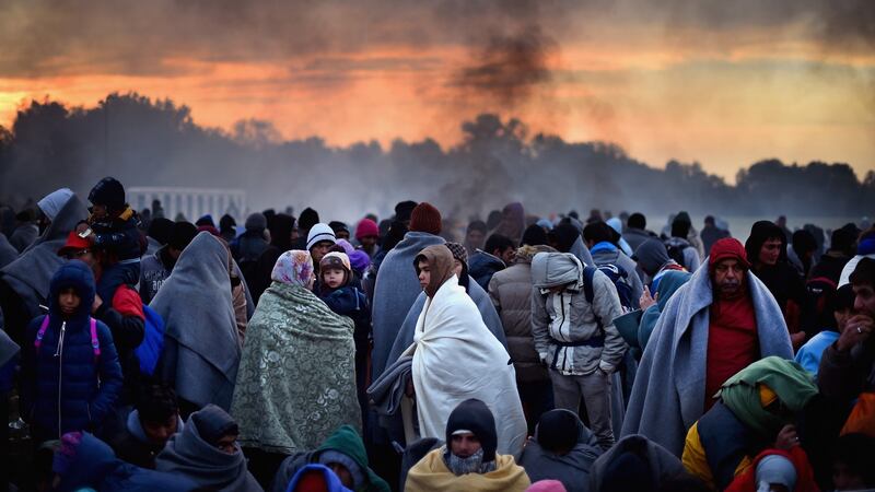 Migrants are held back in Slovenia in October. Photograph: Jeff J Mitchell/Getty