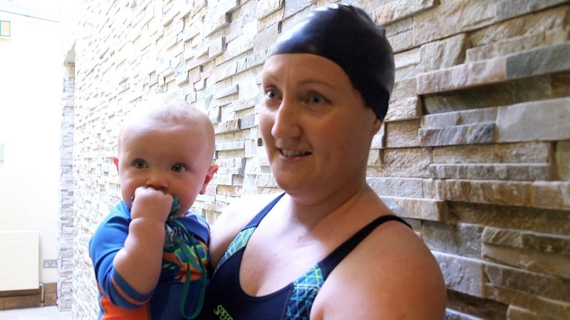 Siobhán Gannon and her son Ruairí:  “I’m due back at work next week, and it’s a big decision whether I’ll go back or not. The cost of childcare is almost the same as what I earn.”  Photograph: Bryan O’Brien