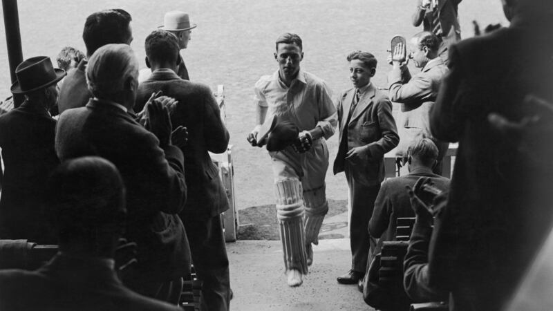 England  captain Len Hutton leaves the field during the fifth test of the 1938 Ashes match against Australia at the Oval. Photograph: Central Press/Getty Images