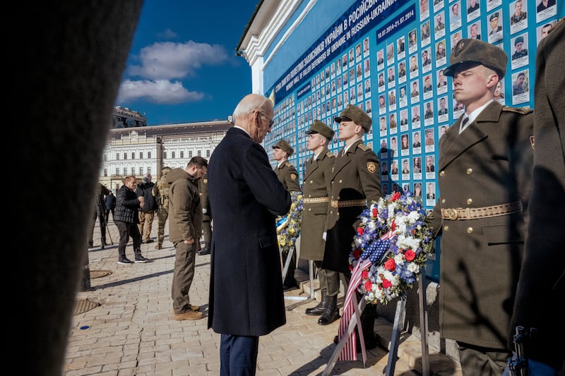 Joe Biden and Ukrainian president Volodymyr Zelenskiy pay respects to fallen soldiers in Kyiv on February 20th, 2023. Photograph: Daniel Berehulak/New York Times
                      