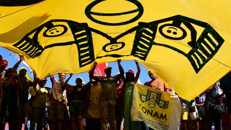 Residents of Rio de Janeiro demonstrate against interim president Michel Temer, political upheaval, corruption and the cost of the Rio 2016 Olympics Games, in front of the Copacabana Palace Hotel on August 5th, 2016. Photograph: Tasso Marcelo/AFP/Getty Images