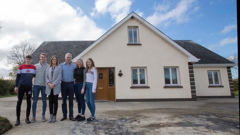 Martin Kenny pictured with his wife, Helen, and children Pearse, Eoin, Claire and Éabha at their home in Co Leitrim. Photograph: Brian Farrell