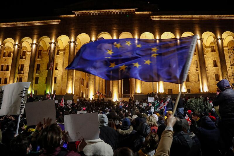 Supporters of Georgian opposition parties take part in an opposition rally in front of the parliament building in Tbilisi, in March. Photograph: Zurab Kurtsikidze/EPA-EFE