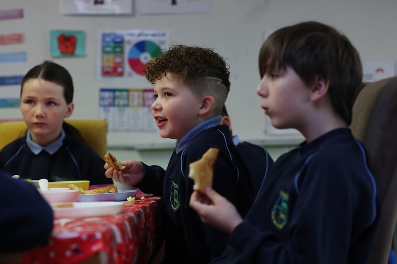  Pupils Lilly Whelan (10), Remi Keoghegan (9) and Mason Whelan (12) in the breakfast club at St Francis Senior National School in Priorswood in North County Dublin. Photo: Bryan O’Brien 


